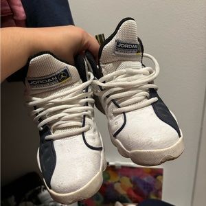 White and blue jordans